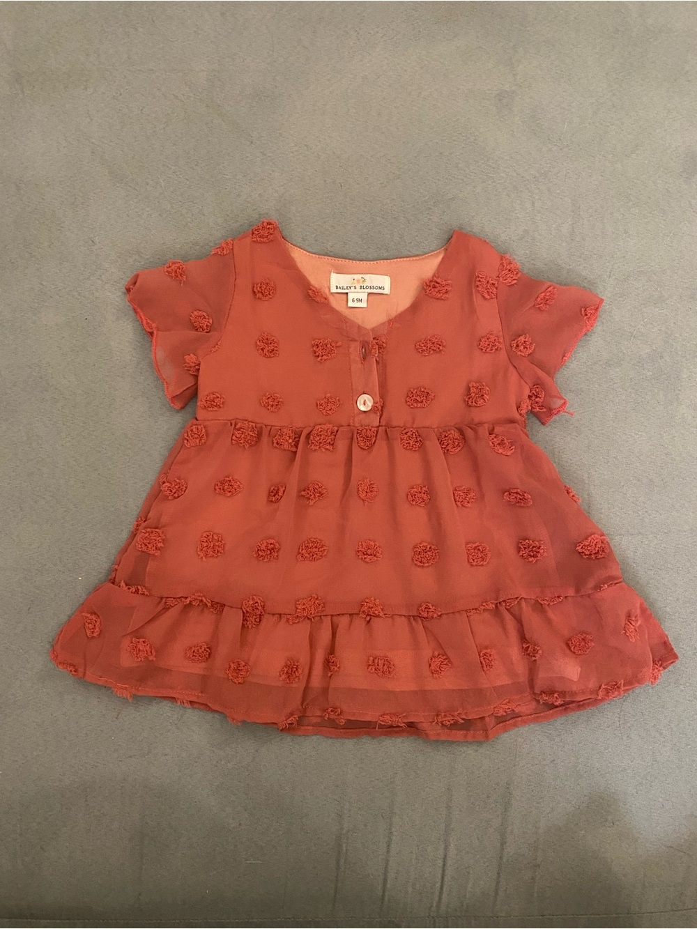 Baby Honey Coral Pom-Pom Tiered Dress by Bailey's Blossoms